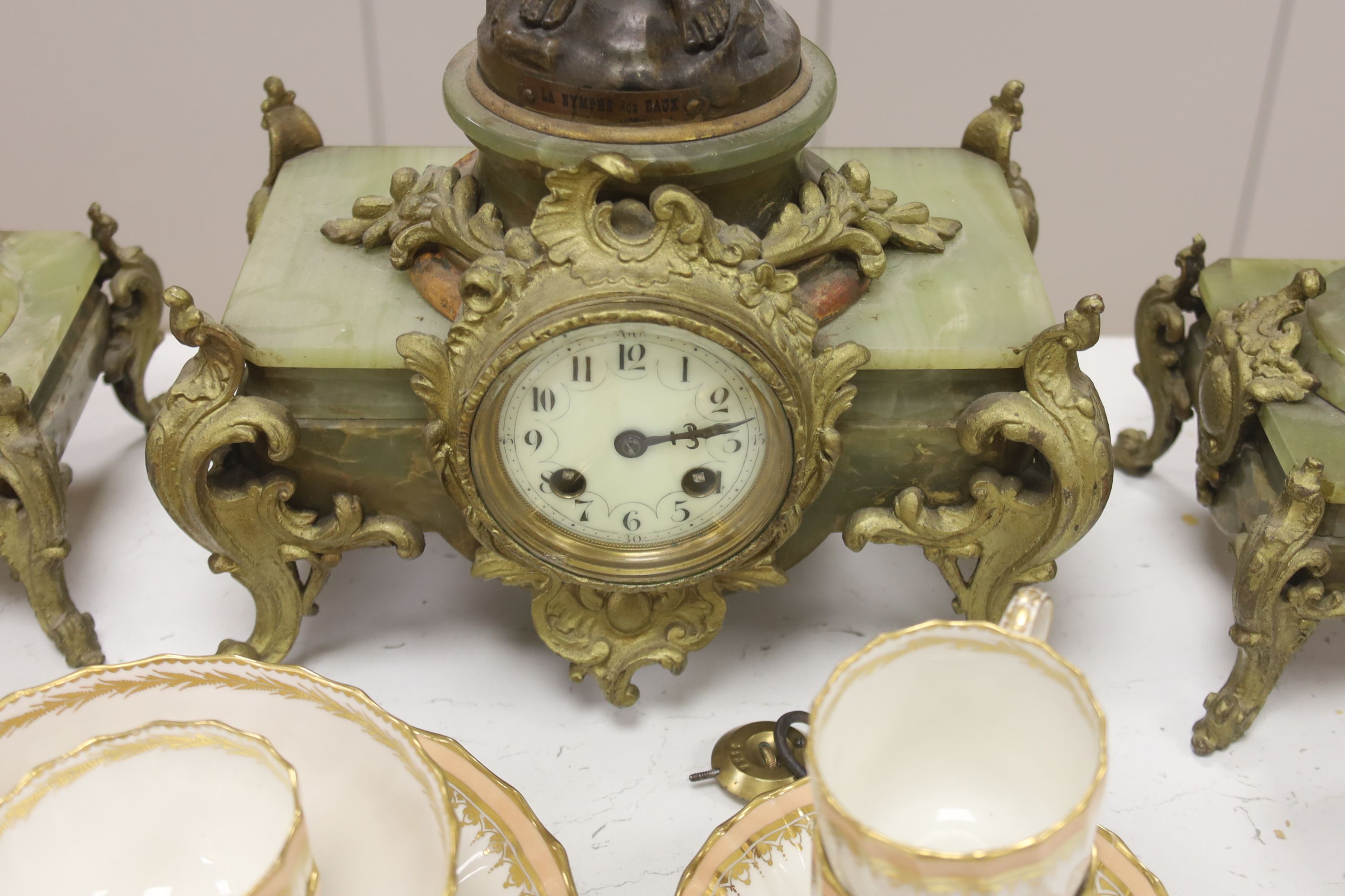 A 19th century French spelter and onyx clock garniture, height 61cm